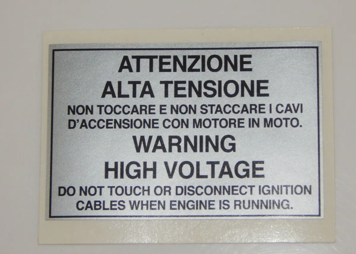 1980'S Ferrari Warning High Voltage Sticker Silver Decal Engine Motor Bay 1
